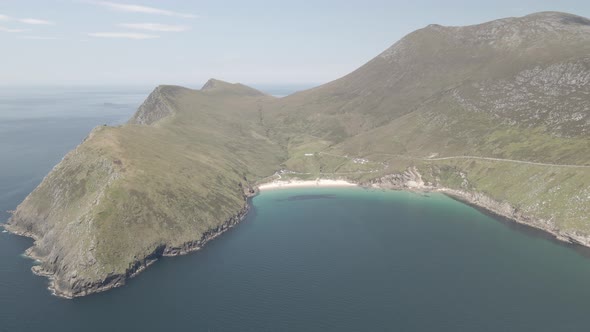 Breathtaking View Of Keem Bay Surrounded By Cliffs Within Achill Island In Ireland. Wide Aerial Shot