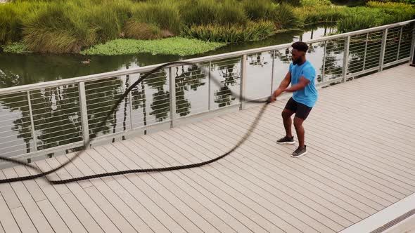 Aerial shot of a man working out in the park