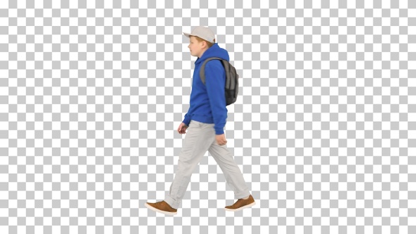 Young boy wearing a backpack walking to school, Alpha Channel