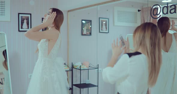 Girls Try on a Beautiful Wedding Dress