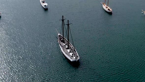 Sailboats Floating On Water Surface In Vineyard Haven Harbor In Cape Cod, Massachusetts. aerial tilt