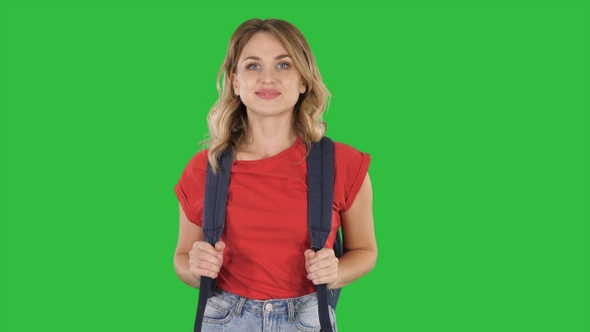 Young Good-Looking Woman in Casual T-Shirt with Backpack