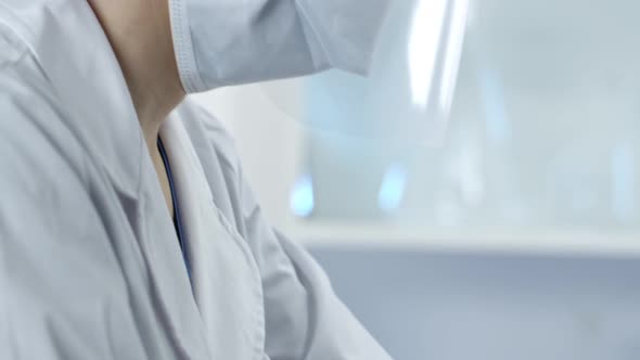 Nurse working on coronavirus test kits