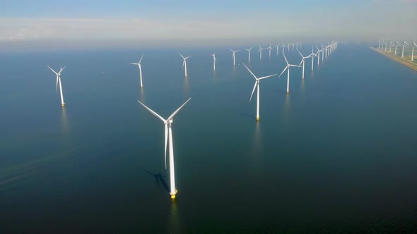 Windmill Park in the Ocean Drone Aerial View of Windmill Turbines Generating Green Energy Electric