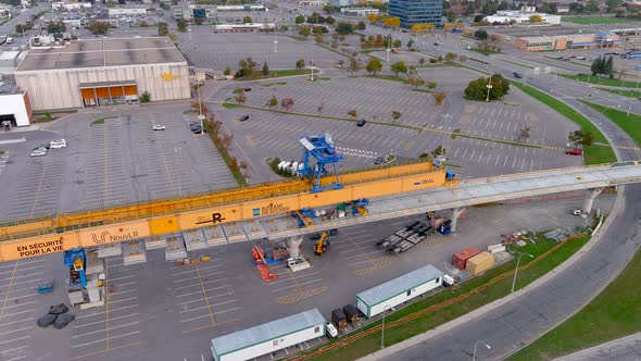 4K camera drone view of the construction site of the REM (Metropolitan Express Network) in Montreal.