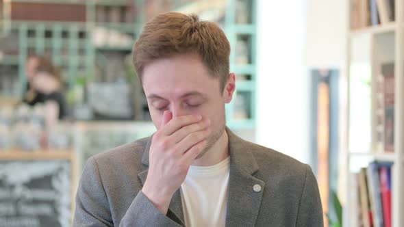 Portrait of Young Man Crying Towards the Camera