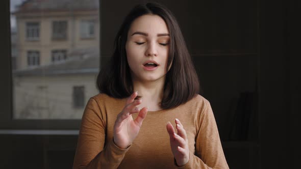 Portrait of Worried Shocked Girl Millennial Brunette Caucasian Model Woman Standing Indoor Alone