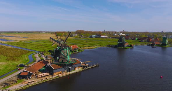 Classic Dutch windmill at Famous tourist location of Zaanse Schans at the outskirts of Amsterdam