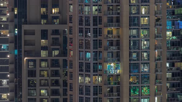 Big Glowing Windows in Modern Residential Buildings Timelapse at Night