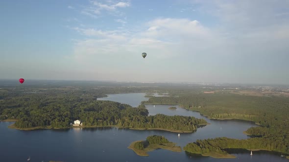 Two Hot Air Balloons Over Trakai Castle, Which Is Located in Lithuania Near the Capital of Vilnius