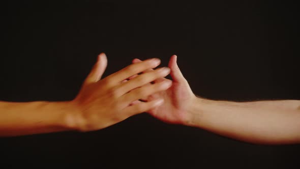 Diverse People Making Handshake Gesture Isolated on Black Background