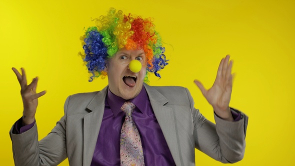 Clown Businessman Entrepreneur Dancing, Celebrate, Making Silly Faces at Work