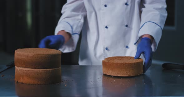 A Close Up of a Baker with Large Hands Getting