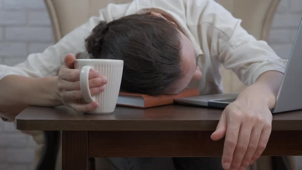 Sleepy office worker with coffee. 