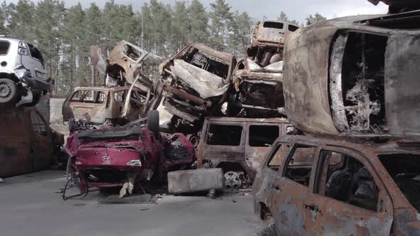 War in Ukraine a Dump of Burned Cars in Irpin Bucha District