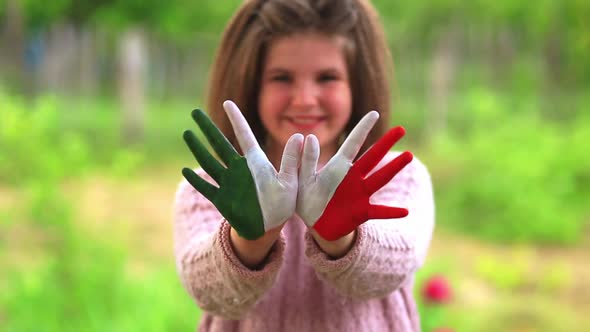 Mexico Flag Painted on Teen Girl Hands Focus on Hands