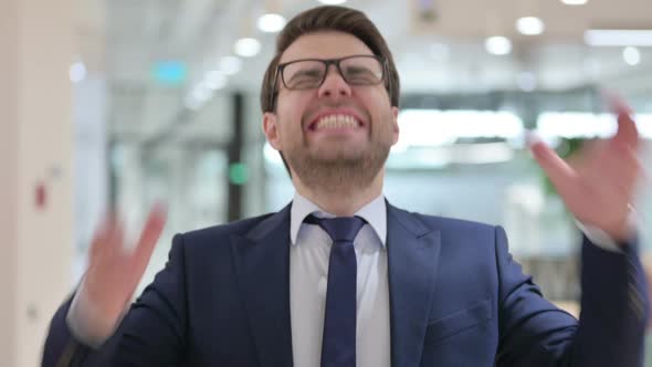 Portrait of Disappointed Businessman Screaming Shouting