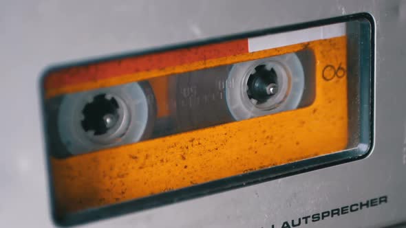 Audio Tape. Vintage Tape Recorder Plays Audio Cassette Inserted Therein