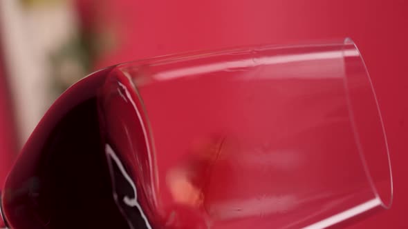 Vertical video, Close-up: red wine is poured into a glass