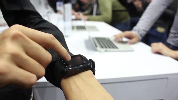 Girl Using Smart Watch In A Public Place