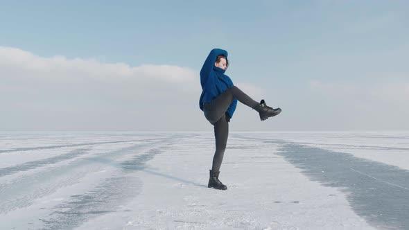 Stylish Young Woman in Sweater Professional Dancer Dancing Energetic Jazz Funk or Hip Hop on Frozen