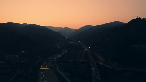 Aerial view highway between the mountains