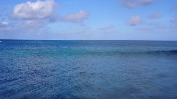 Drone seascape of seashore beach by blue sea and sand background