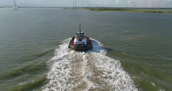 Drone view of tugboat in water