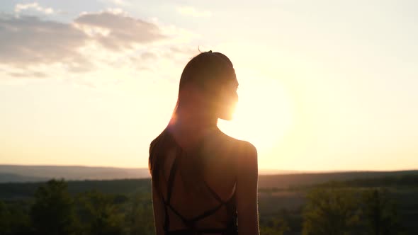 Young Pretty Woman in Black Dress