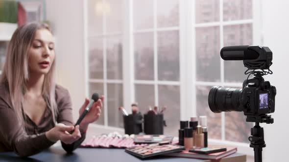 Make Up Artist Recording a Video Tutorial in Her Studio