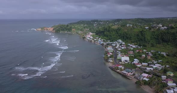 Beautiful Aerial View Of The Coast Of Dominica, Flying Over The Village Of Calibishie