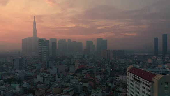 Ho Chi Minh City early morning aerial panorama with fog over Binh Thanh and District one featuring s