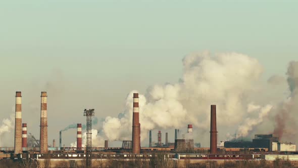 Heavy industry footage. Industrial chimneys smoke.