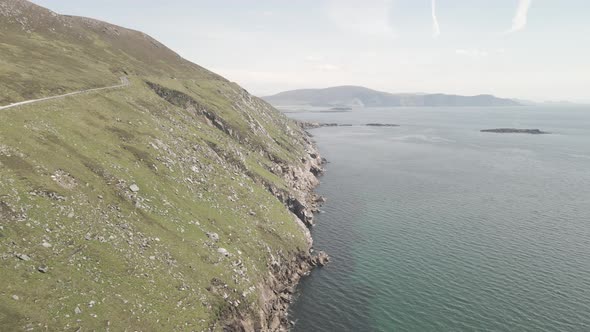 Narrow Road On Cliff Of Achill Island With Scenic View Of Atlantic Ocean In Ireland. - aerial