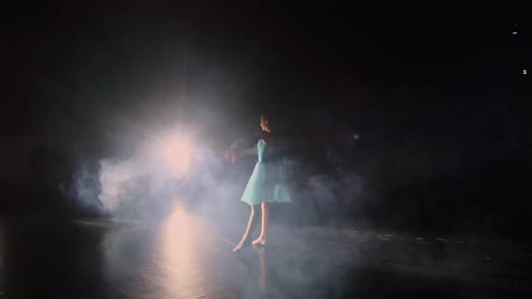 Young Ballerina Spinning on the Stage