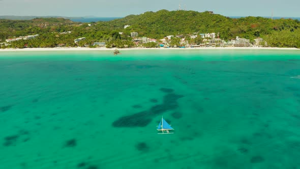 Sailing Boat in Blue Sea