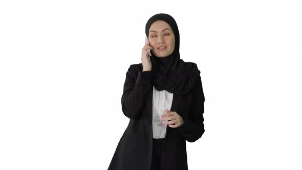 Arabic Business Woman Wearing Hijab Speaking on the Phone on White Background