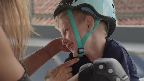 Mom and Son Having Fun at Skatepark