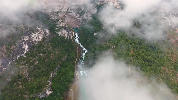 Aerial view of La Sorgue river crossing Fontaine de Vaucluse, France.