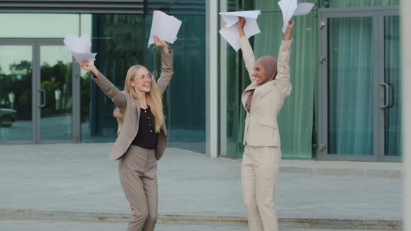 Overjoyed Diverse Female Businesspeople Have Fun Celebrate Successful Project Together Happy Excited