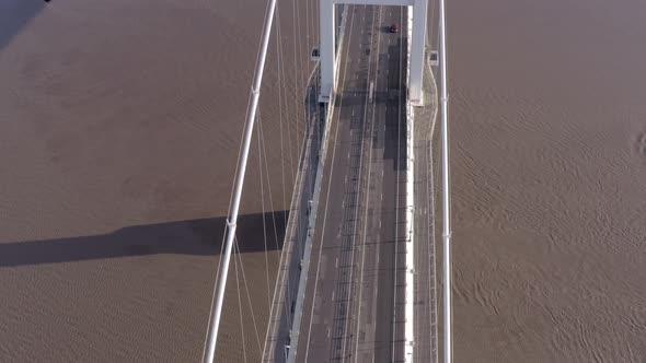 Cars and Vehicles Crossing the Severn Bridge in the UK Aerial View