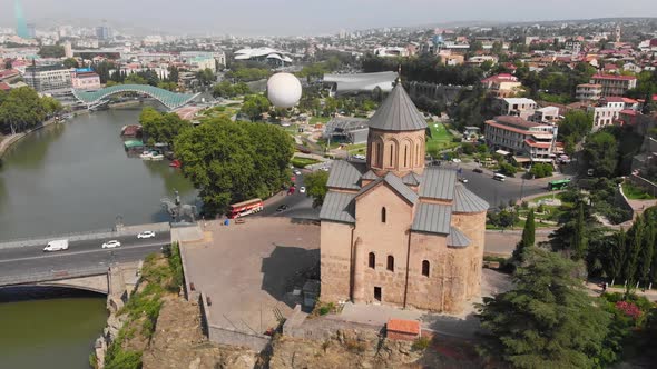 Flying Around the Metekhi Church and Tbilisi Cityscape in Summer