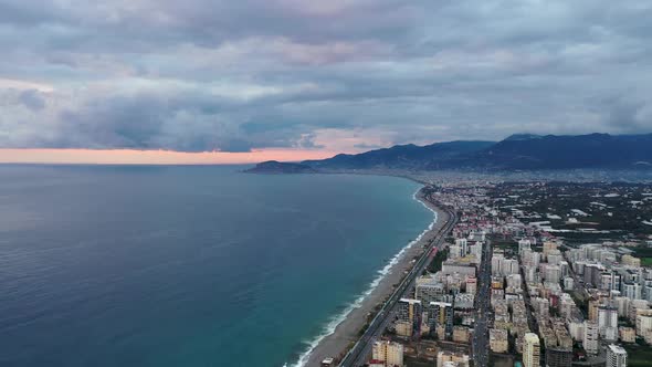 Colorful Sunset Over the City Aerial View 4 K Alanya Turkey