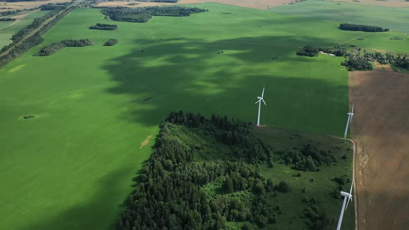 Windmills in Summer in a Green Field