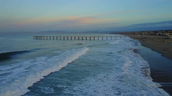 Aerial drone uav view of a pier, beach and ocean