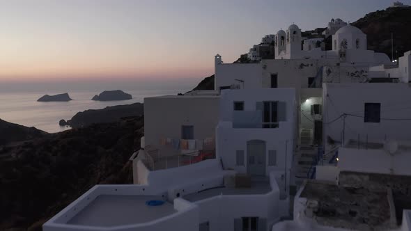 Aerial View of Little Village on Milos Island, Greece After Sunset with Ocean View