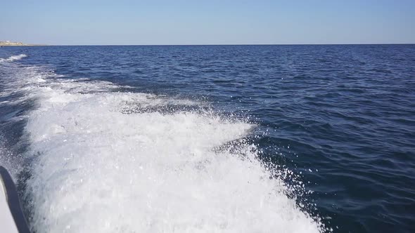 Motor Boat Goes on the Sea, Waves From the Back of the Speedboat