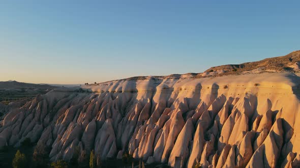 Sunset in Cappadocia Red Valley Landscape with Horse Riders