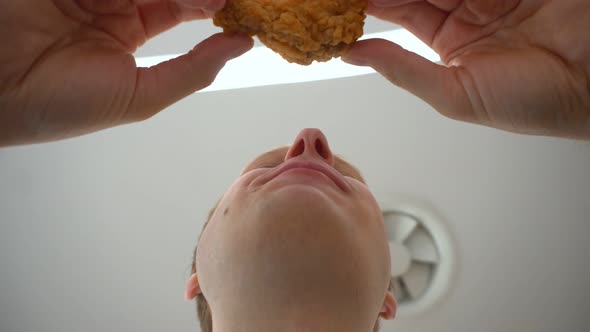 Male Man Eats Fast Food Fried Chicken Spicy Wing Inside Cafe Restaurant