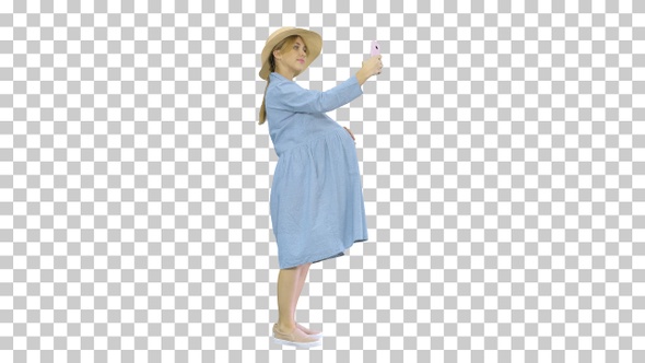 Happy pregnant woman in a hat using her, Alpha Channel